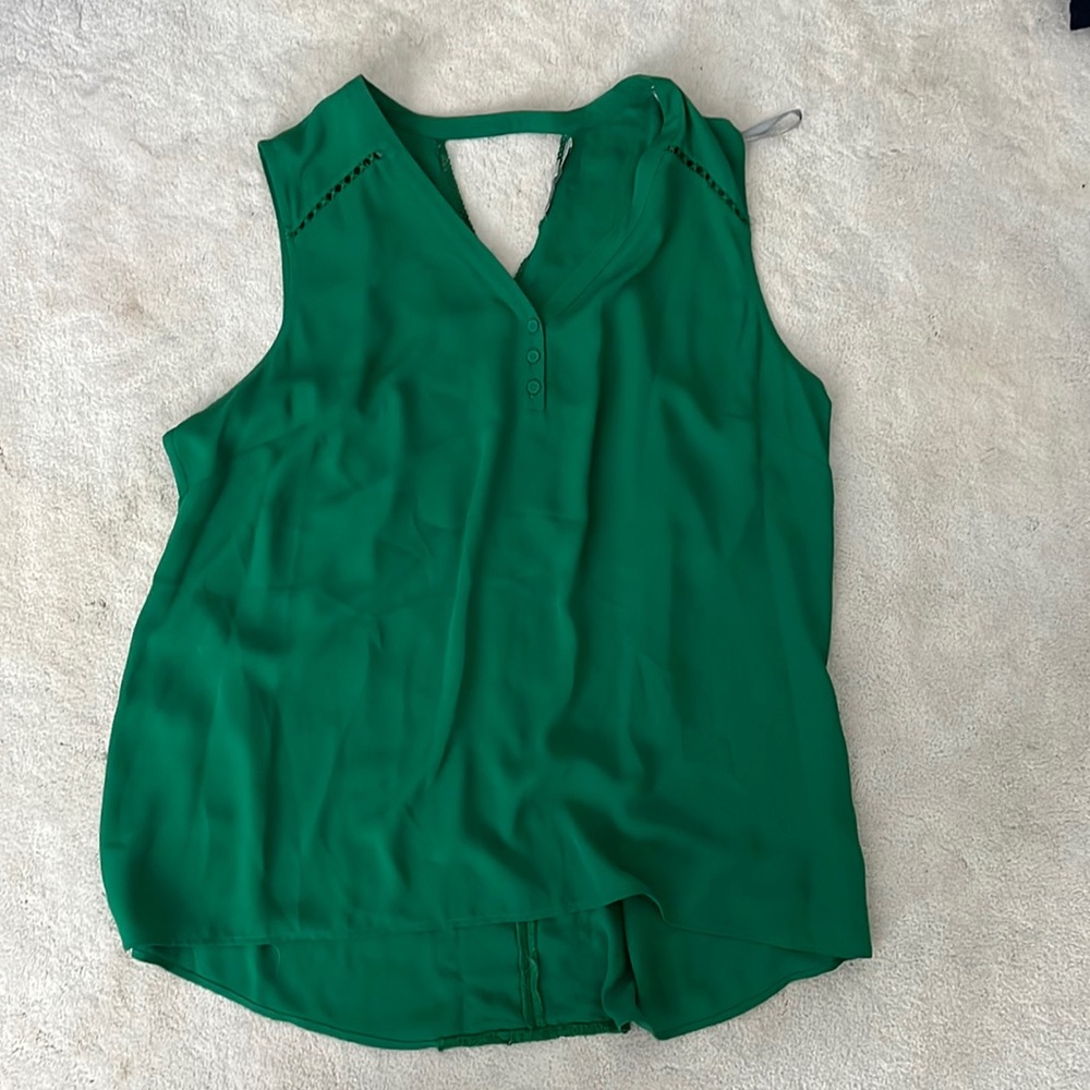 Green blouse. Detail on back. Size XL